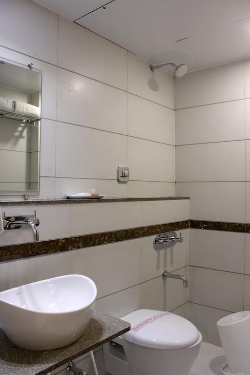 Hotel Ashray Inn Ahmedabad Zimmer foto